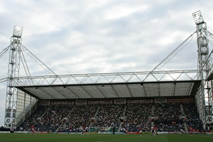 Football Rivalry Unfolds: PNE vs. Bristol City - Passionate Supporters in Action at Deepdale